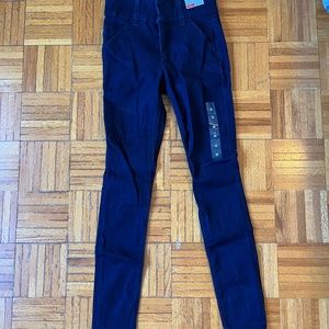 Dark denim skinny jeans with thick waistband